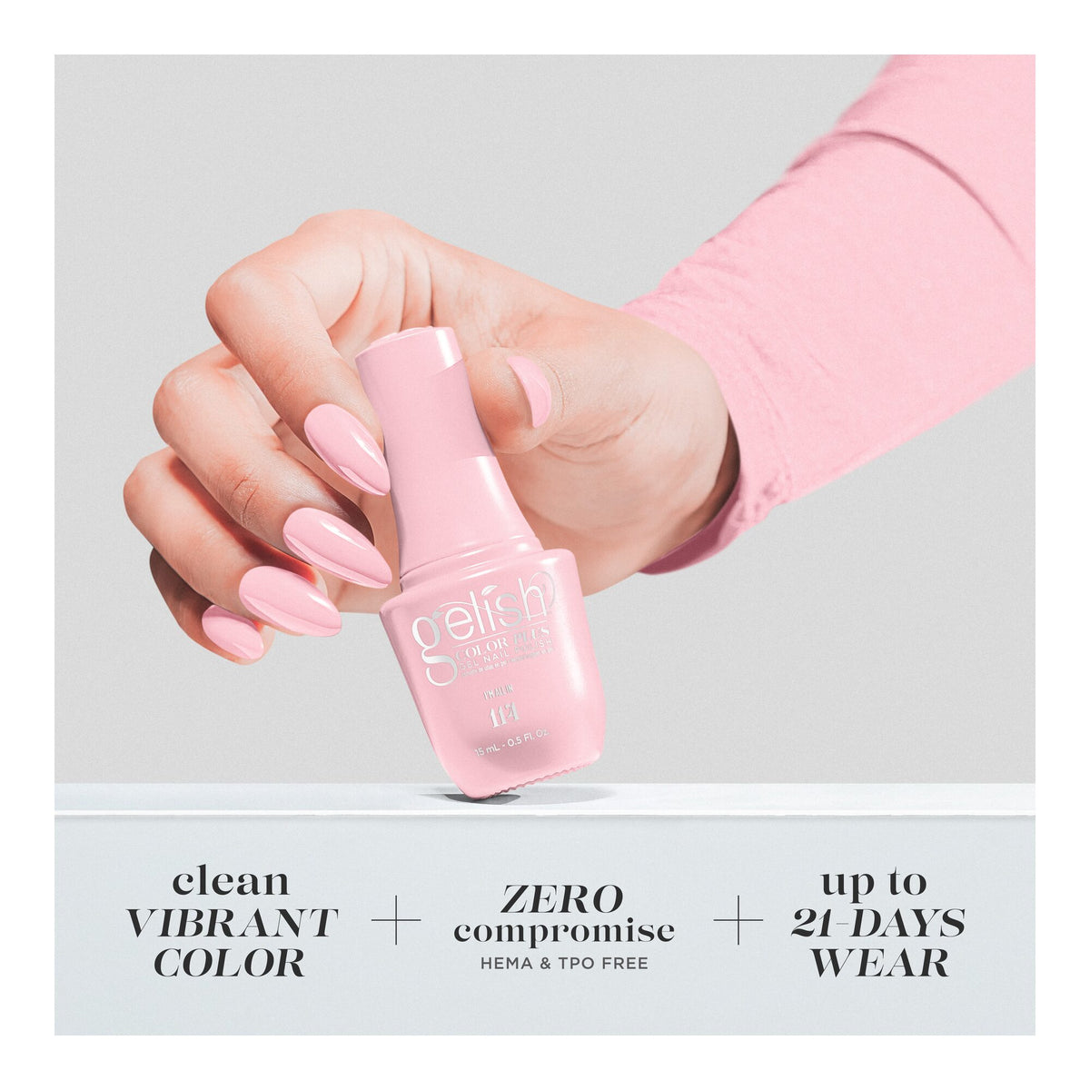Hand holding bottle