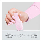 Hand holding bottle