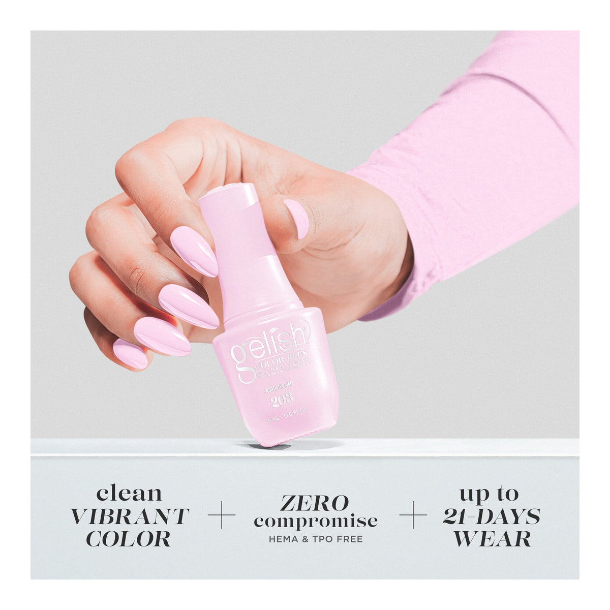 Hand holding bottle
