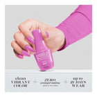 Hand holding bottle