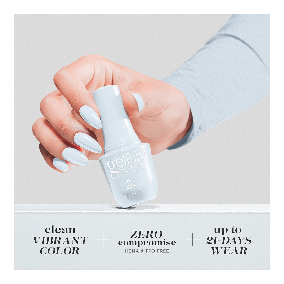 Hand holding bottle