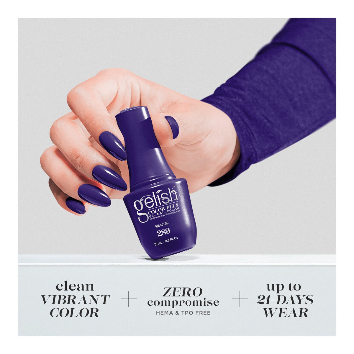 Hand holding bottle